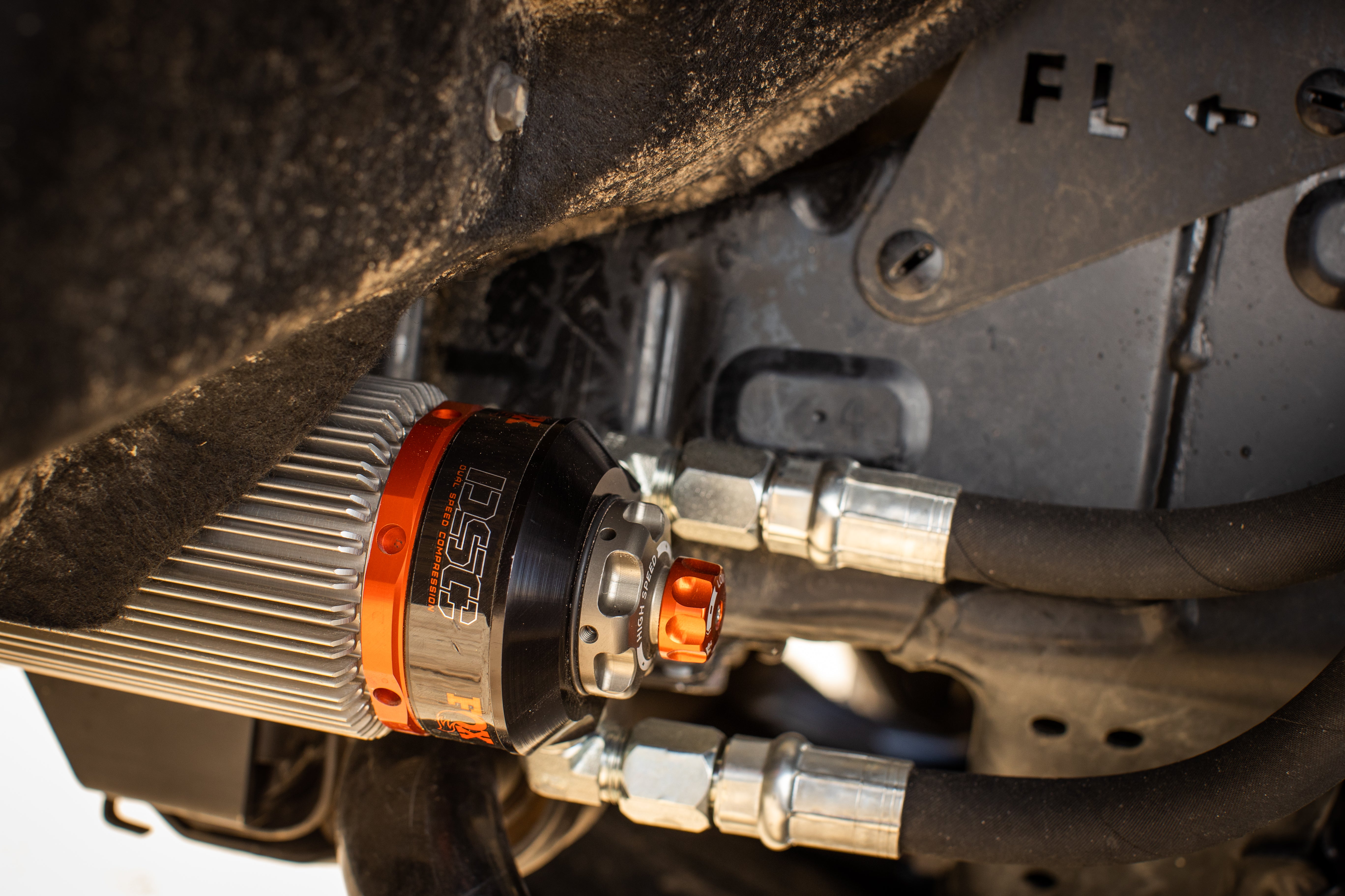 '22-24 Toyota Tundra FOX 3.0 FACTORY RACE RR Coilovers & Rear Shocks (1-2" Lift) w/ Upper Arms & Trailing Arm Combo Kit Close-up Display on Vehicle