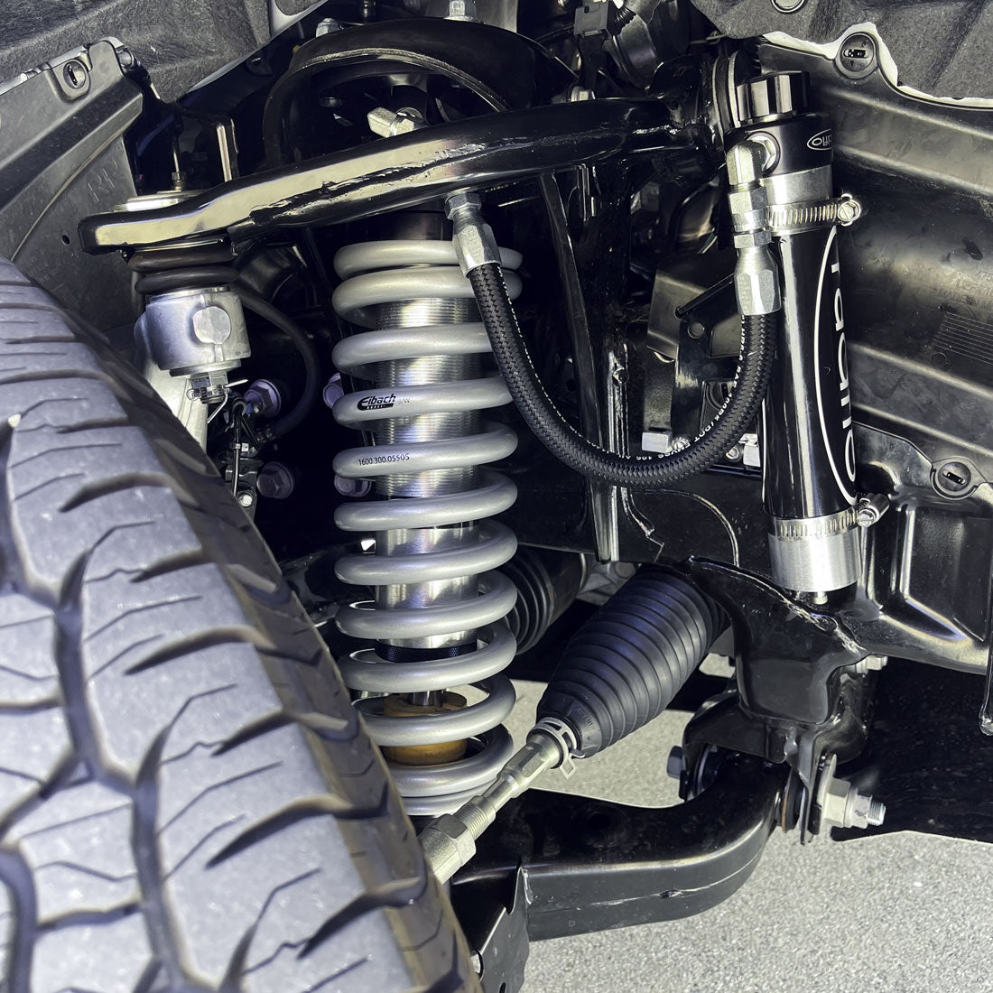 Radflo OE Replacement 2.5 Front Coilover Kit Toyota Tacoma 2024+ With Remote Reservoir Extended For Use With Aftermarket Upper Control Arms 2.5″ Lift