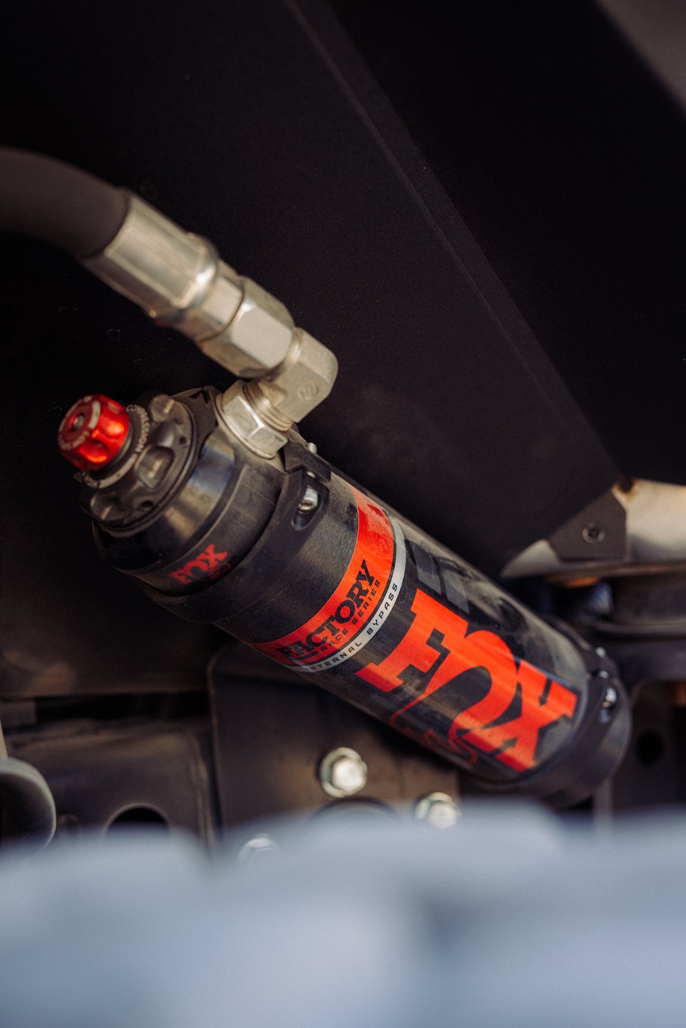 '07-18 Jeep JK FACTORY RACE 2.5 INTERNAL BYPASS RESERVOIR SHOCK (PAIR) - ADJUSTABLE - FRONT SHOCKS Close-up Display on Vehicle