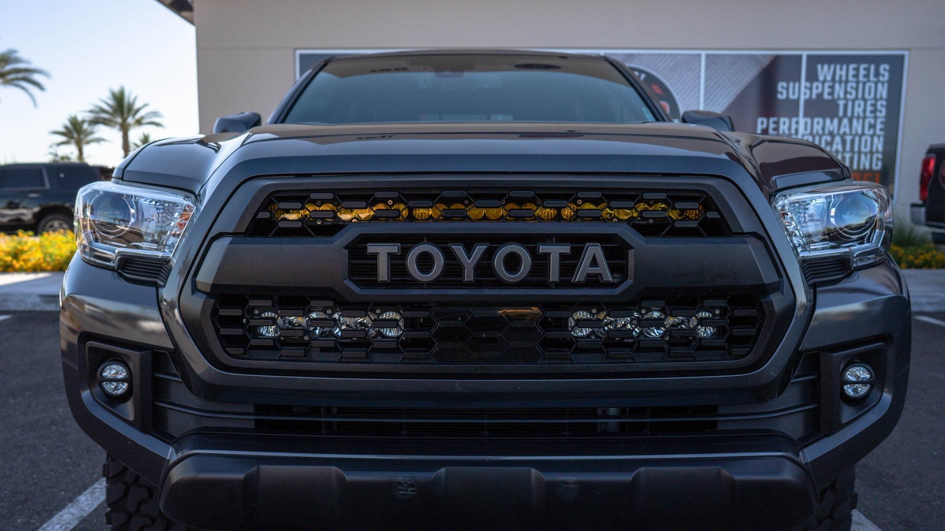 '16-23 Toyota Tacoma SDHQ Built BTG Dual 10" Light Bar Mount Lighting SDHQ Off Road (front view)