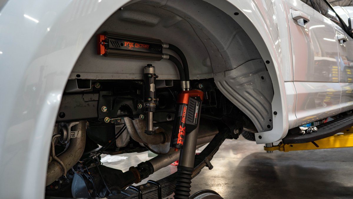 '19-20 Ford Raptor 3.0 Fox Live Valve Rear Shocks - 883-09-153 Close-up Display on Vehicle