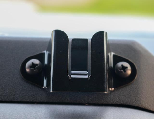 CB Mic and Handheld Radio Holder Close-up Display in Vehicle