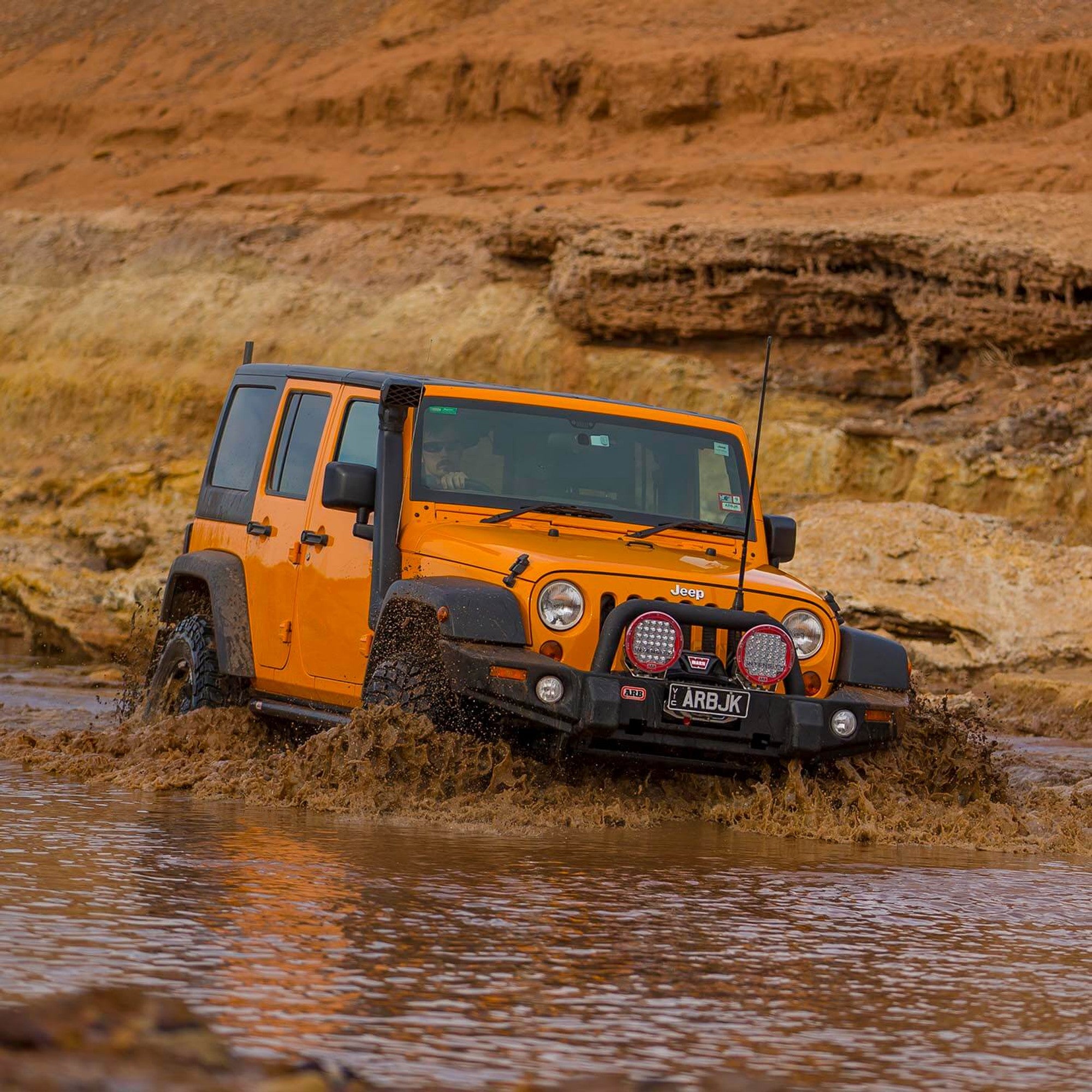 07-18 Jeep JK Wrangler Safari Snorkel Intake Kit Display on Vehicle in use (Front Angled View)