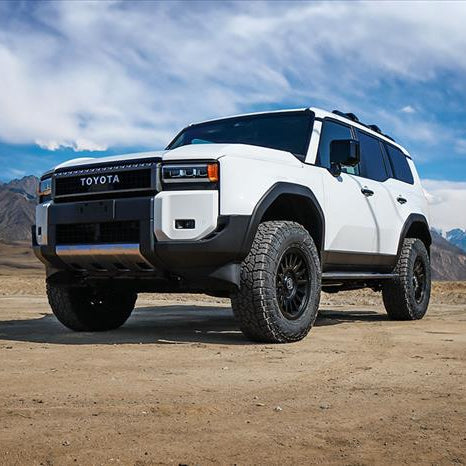 '24+ LC250/GX550 0-3" Lift Rear 2.5 Shocks w/ Remote Reservoirs & CDCV Front View