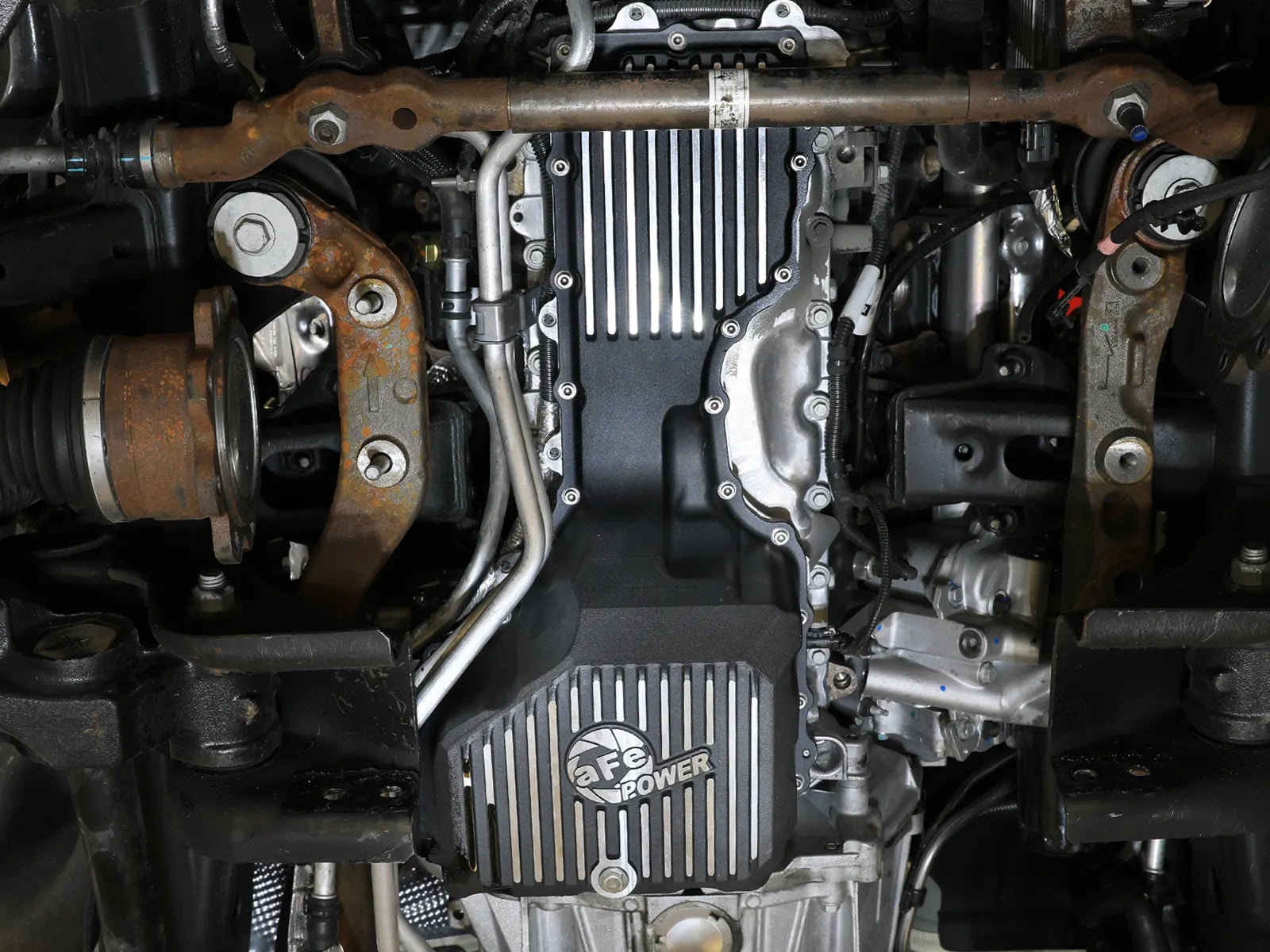 aFe POWER Pro Series Engine Oil Pan Black w/ Machined Fins GM Diesel Trucks 20-25 V8-6.6L (td) L5P Front View Black