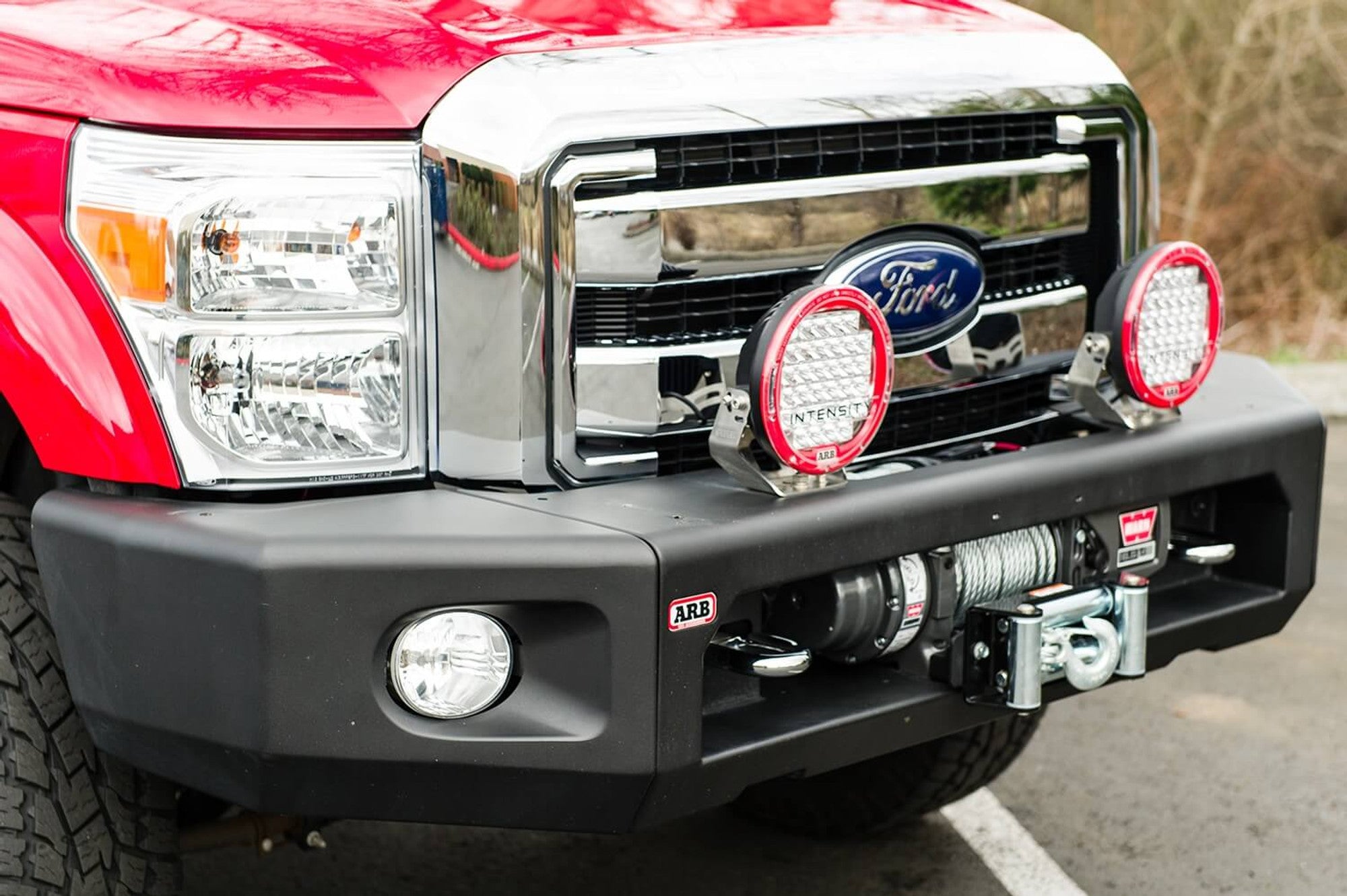 11-16 Ford F250/F350 Full Width Modular Bumper up-Close Display on Vehicle (Front Angled View)