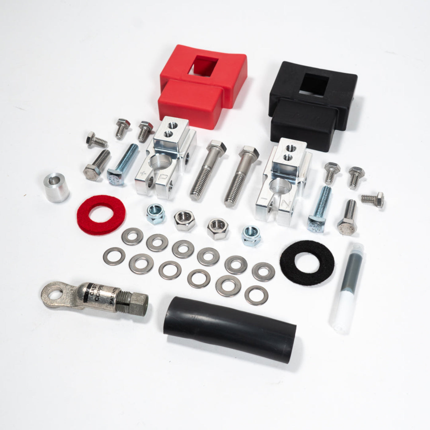 2015-2025 Ford F150/Raptor Complete Billet Battery Terminal Kit display of included parts and hardware 