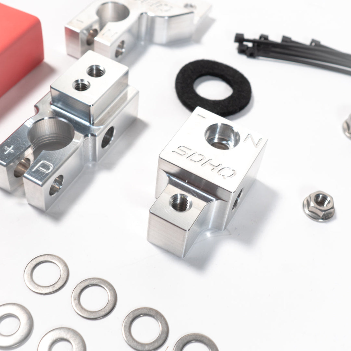 2018-2023 Jeep JL/JT (392 & 3.0L Eco Diesel) SDHQ Built Billet Battery Terminal Kit display of included parts and hardware 