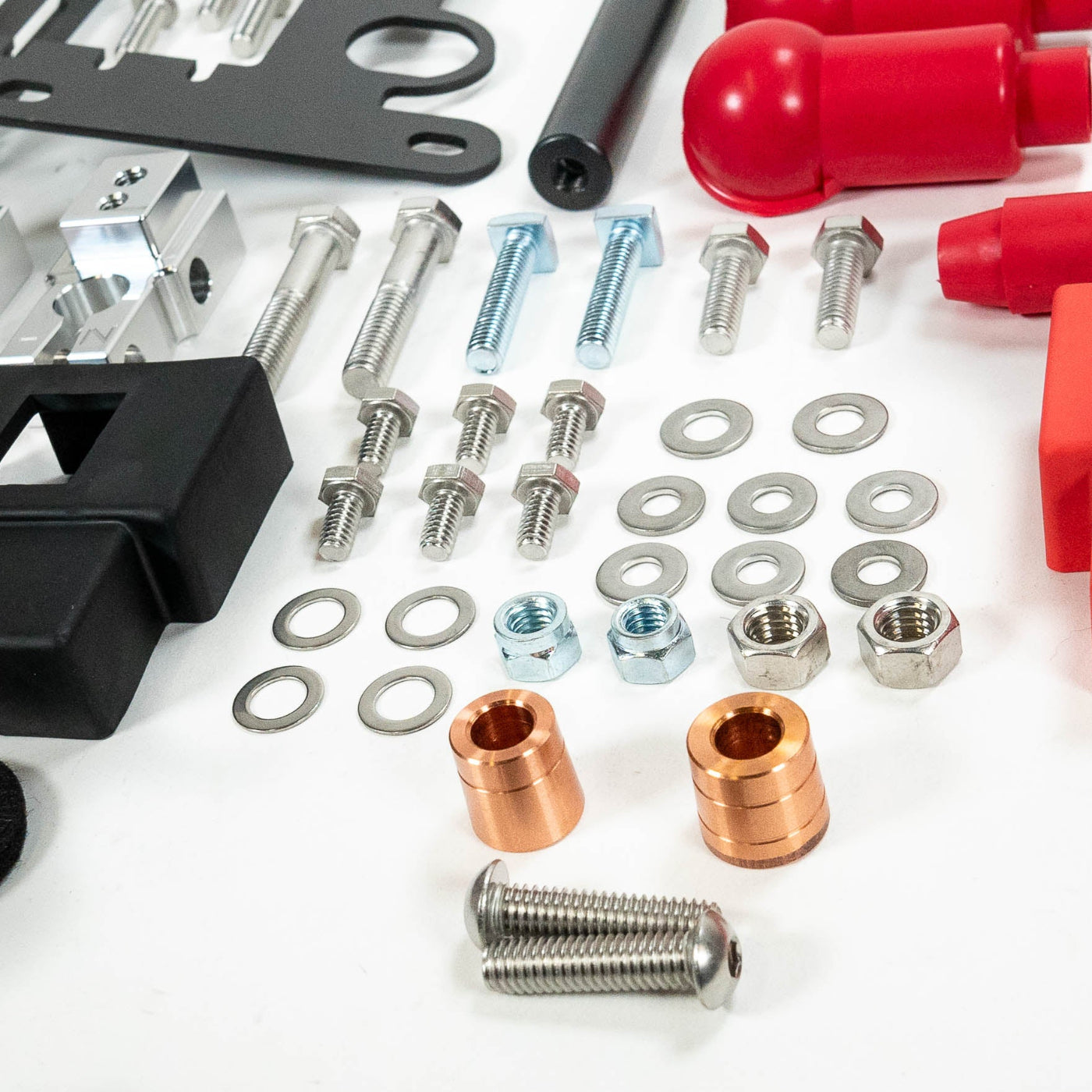 '24+ LC250 SDHQ Built Under Hood Power Solution Kit display of included parts and hardware - close-up