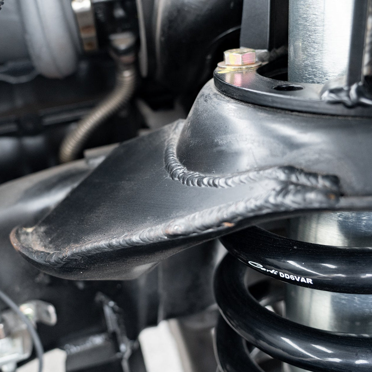 2003-2009 RAM 2500/3500 Carli Coil Bucket Gussets Front View