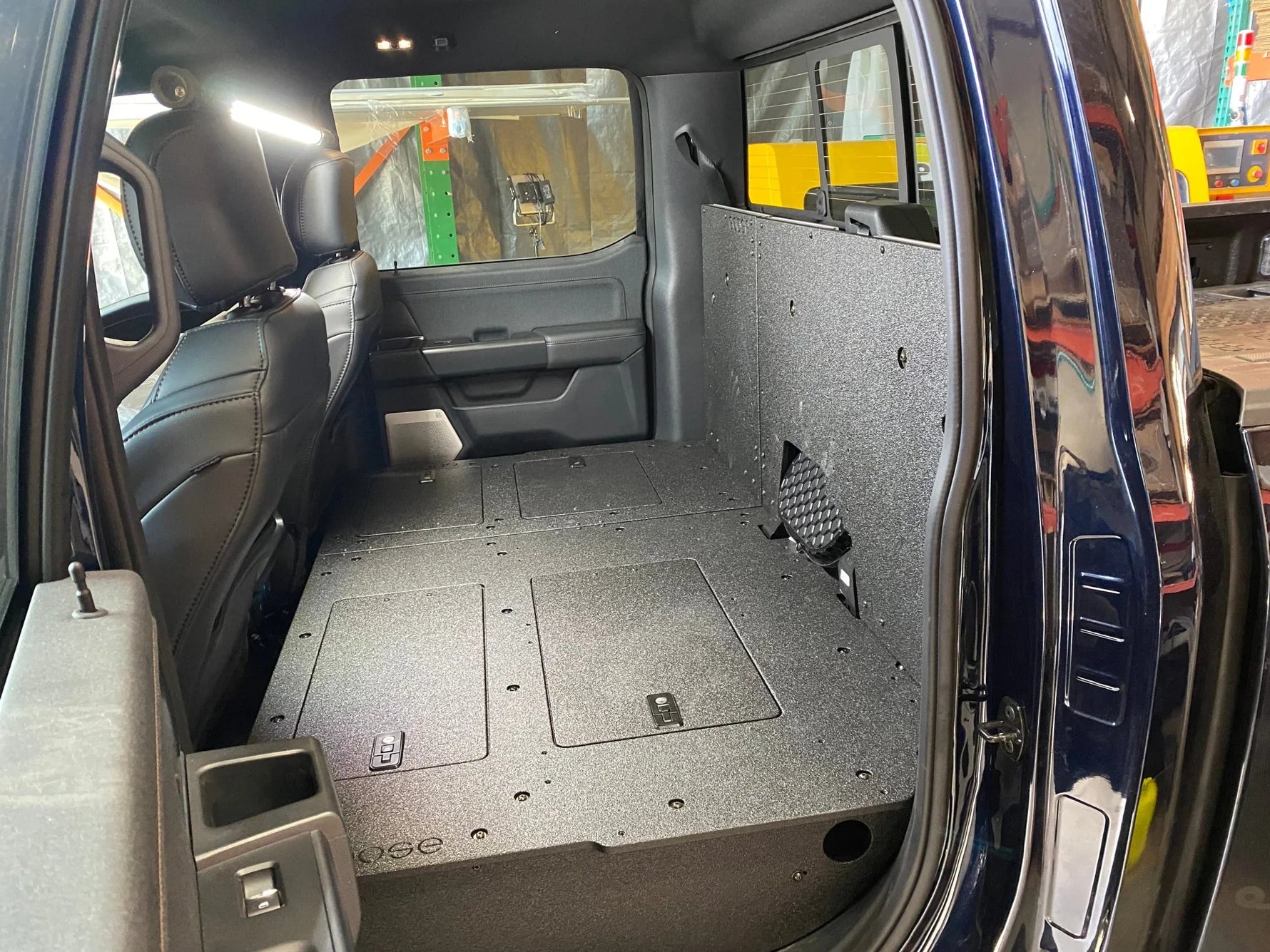 Ford Super Duty F250-F550 2017-Present 4th & 5th Gen. Crew Cab - Second Row Seat Delete Plate System Front View