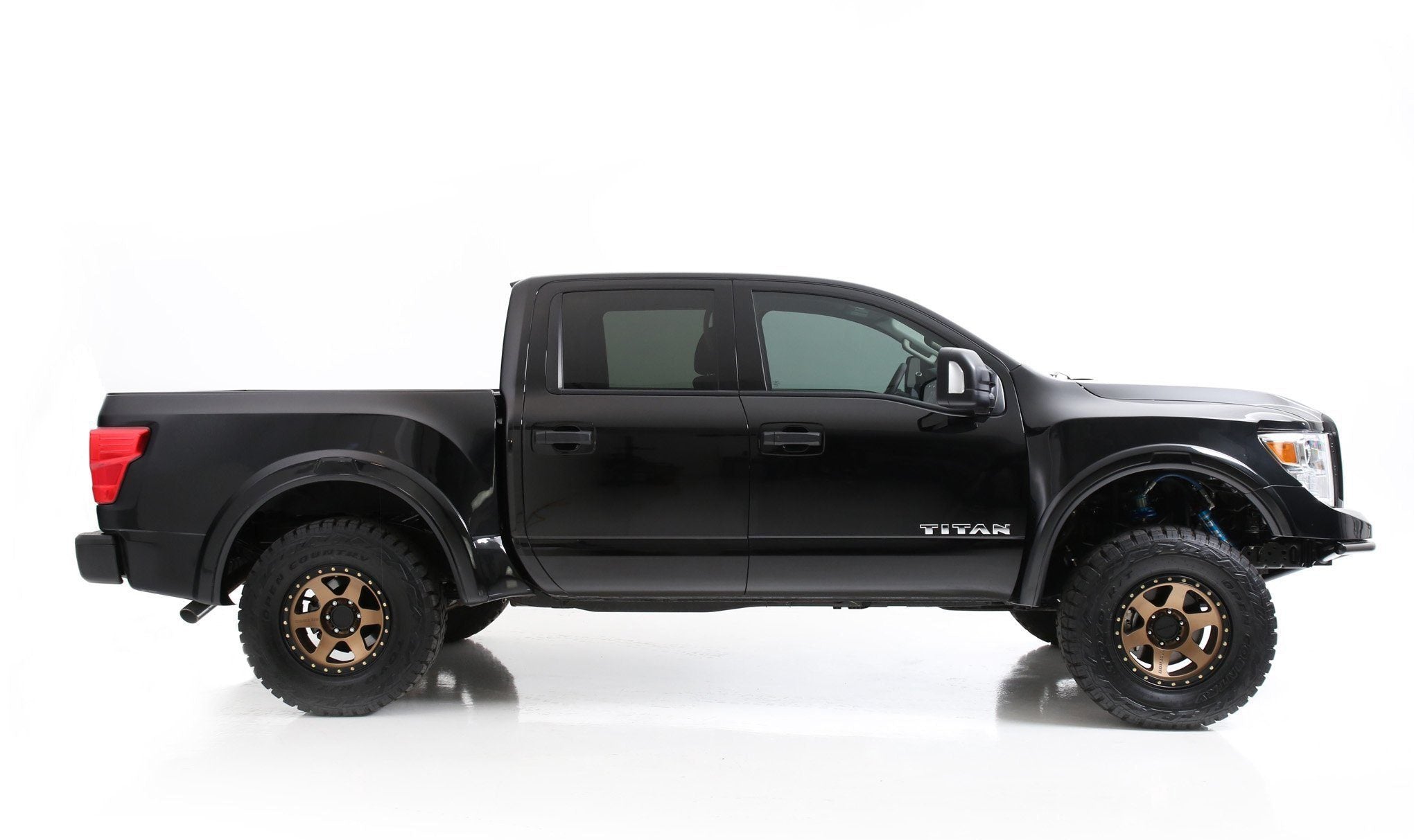 '16-18 Nissan Titan Pro 4X Bedsides | 4" Bulge Fiberglass Fiberwerx (side view)