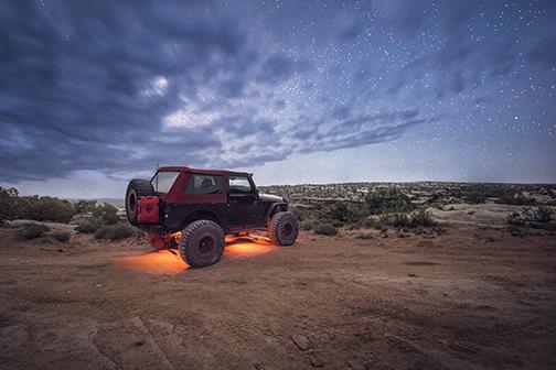 '18-23 Jeep JL Wrangler Rock Light Kit Lighting Baja Designs display on Vehicle (In Use)