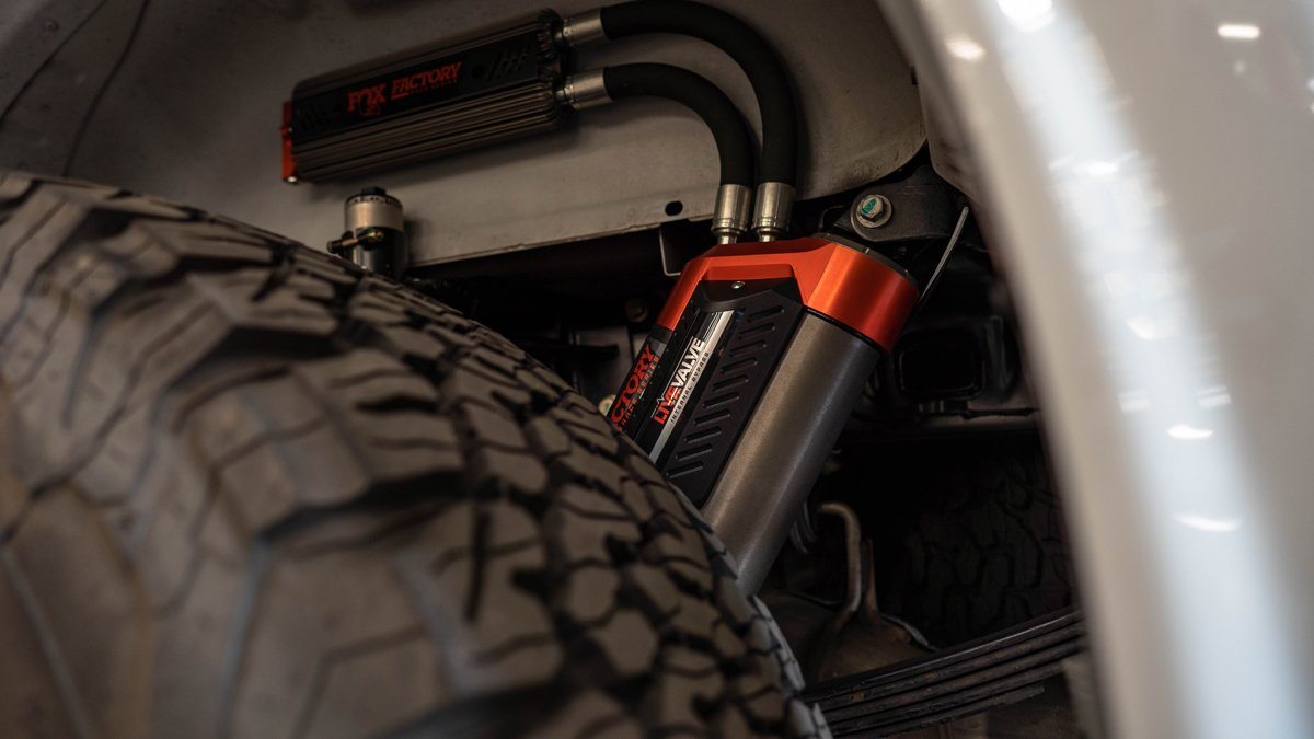 '19-20 Ford Raptor Fox Factory Race Series 3.0 Live Valve Internal Bypass Coilovers & PB Rear Shock Package Close-up Display on Vehicle 
