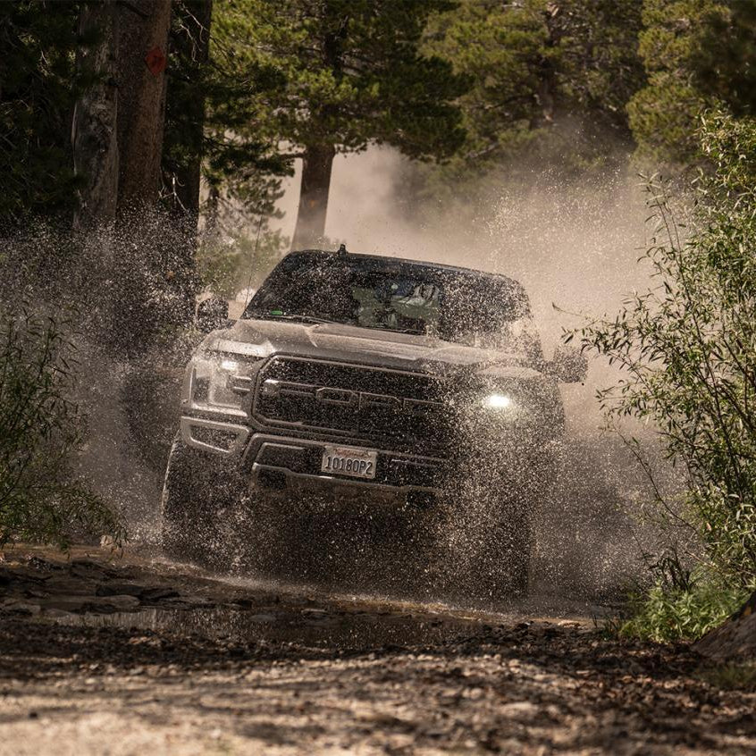 '19-20 Ford Raptor Fox Factory Race Series 3.0 Live Valve Internal Bypass Coilovers & PB Rear Shock Package Display on Vehicle 