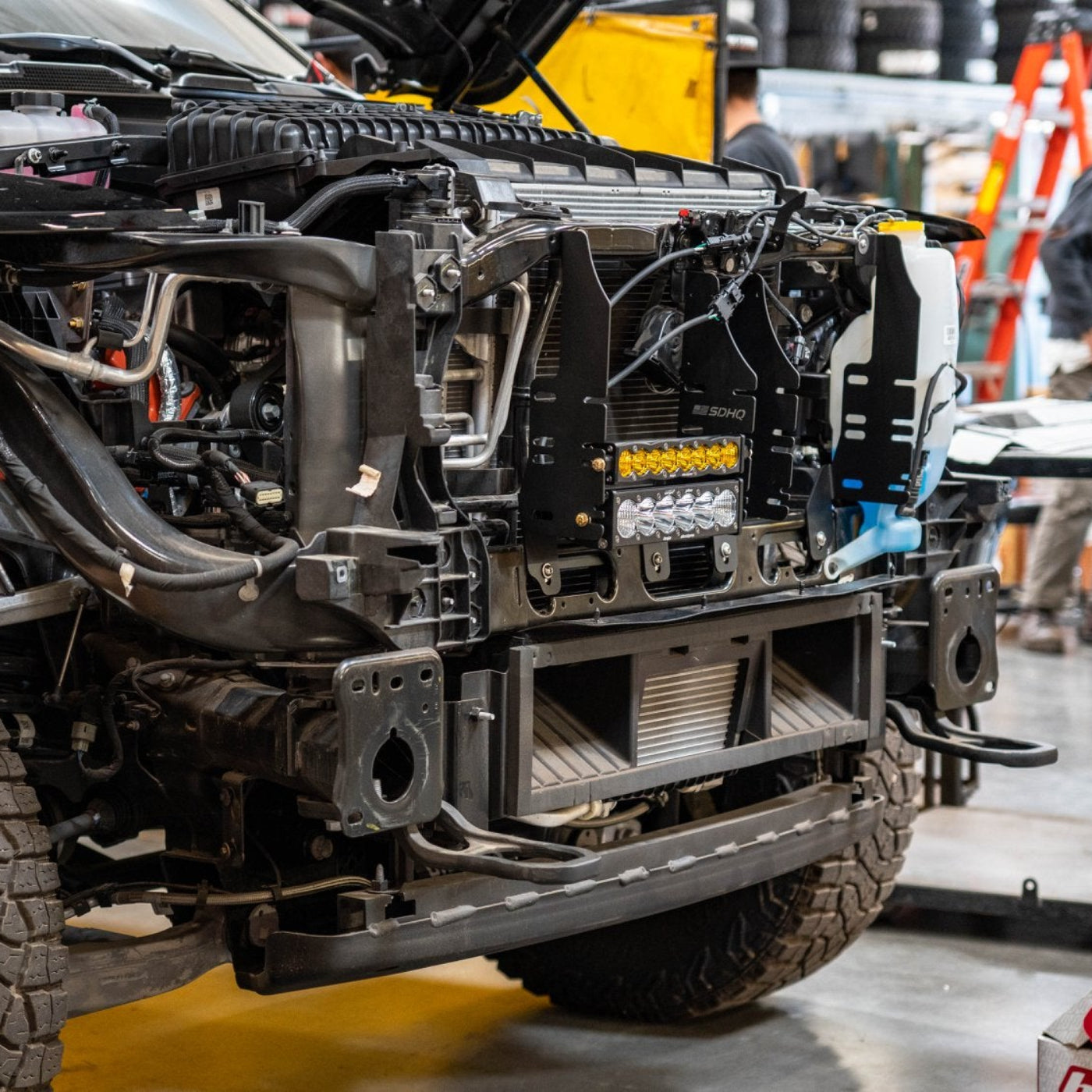 2025 Ram 1500 RHO SDHQ Built Behind the Grille LED Light Bar Mount installed 