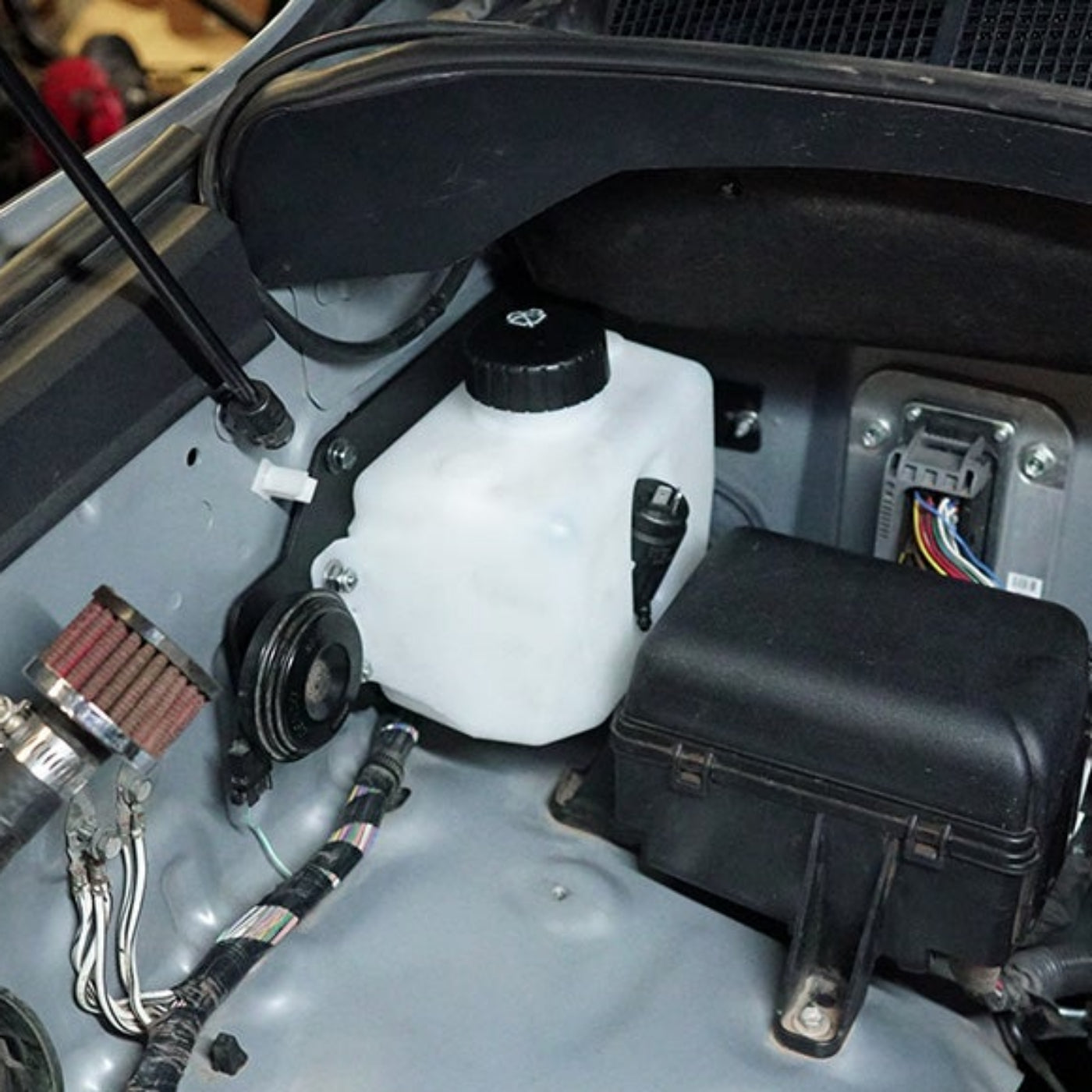 '08-22 Toyota Sequoia SDHQ Built Windshield Wiper Bottle Relocation Kit installed 