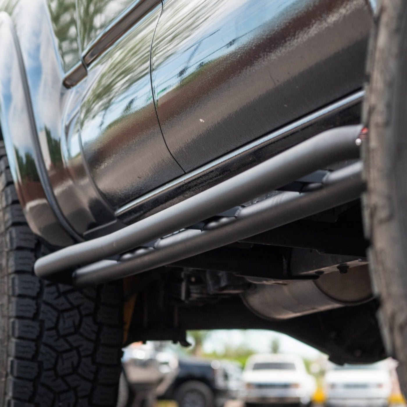 '05-15 Toyota Tacoma SDHQ Built Rock Sliders installed closeup