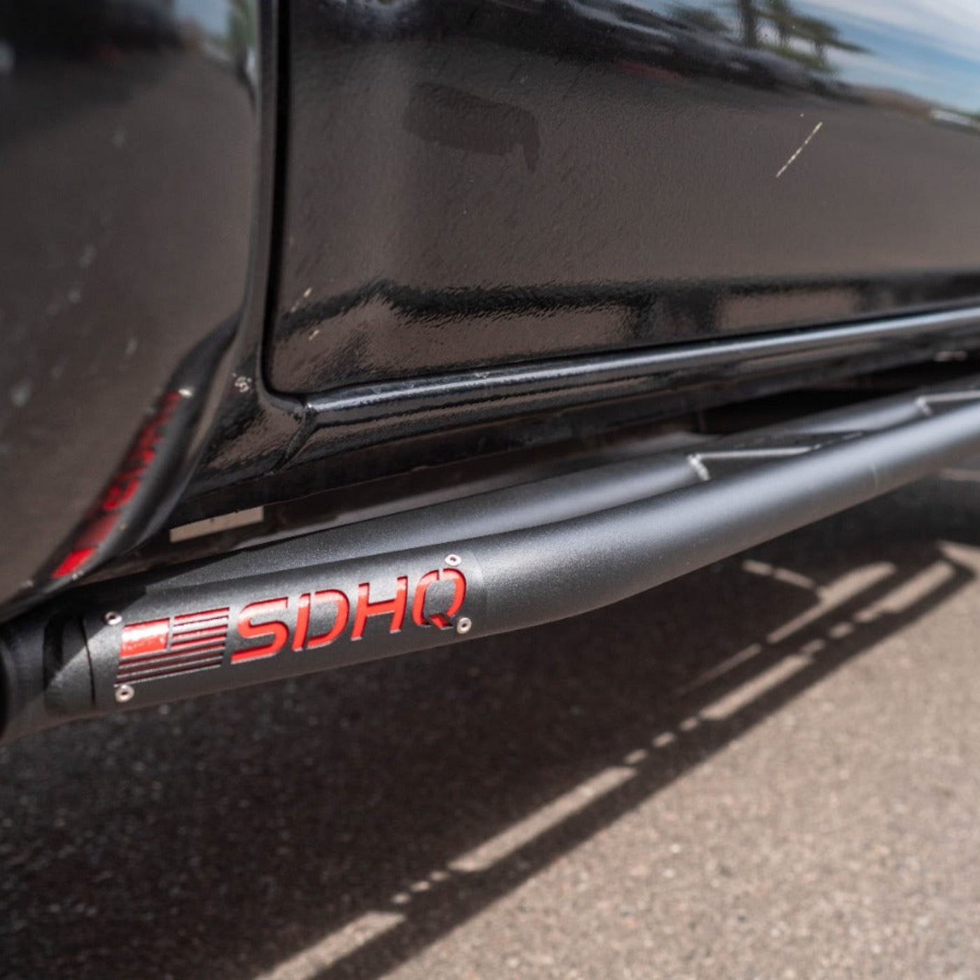 '05-15 Toyota Tacoma SDHQ Built Rock Sliders installed close-up 
